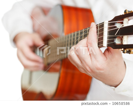 man playing classical guitar close up isolated man playing classical guitar close up isolated 10658586