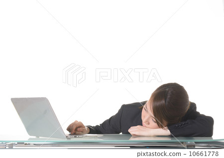 A woman who fells to her desk 10661778