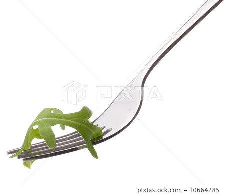 Fresh rucola  salad on fork isolated on white background cutout. 10664285