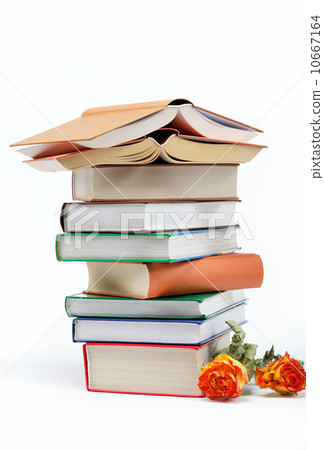A stack of books on a white background. A stack of books on a white background. 10667164