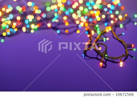 Christmas lights on dark blue background with copy space. Decora Christmas lights on dark blue background with copy space. Decora 10672566