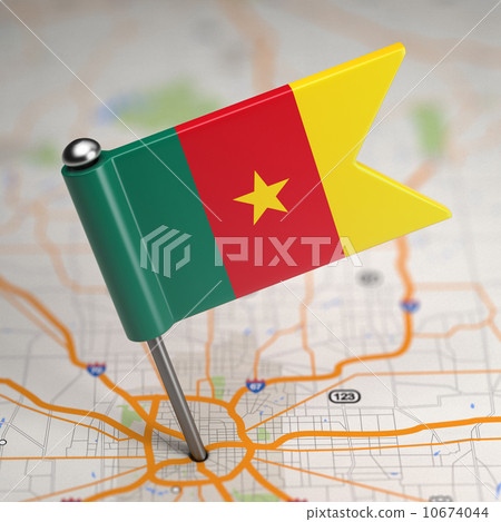 Cameroon Small Flag on a Map Background. 10674044