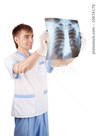 medical doctor looking at x-ray picture of lungs isolated on whi 10674178