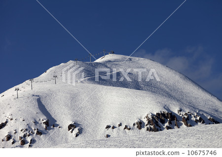 Ski slope and chair lift Ski slope and chair lift 10675746