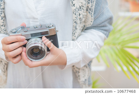 一個女人帶著照相機 10677468