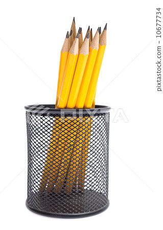 Pencils in pencil holders isolated 10677734