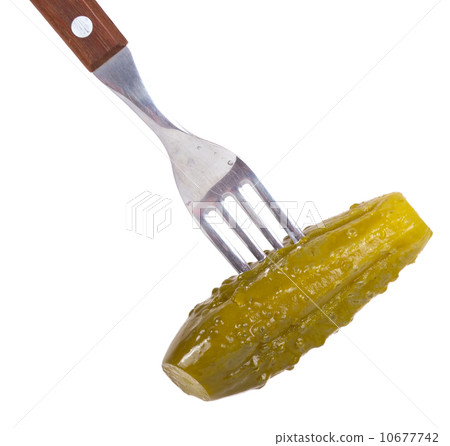 Marinaded cucumber on a fork Marinaded cucumber on a fork 10677742