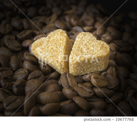 Coffee Beans, Pots, Cinnamon on Dark Background 10677768