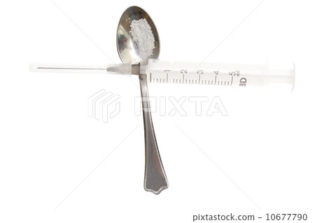 spoon, syringe, vial on a white background 10677790