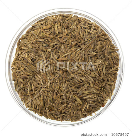 caraway seeds in a glass bowl caraway seeds in a glass bowl 10678497