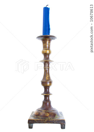 Restored vintage candlestick with candle on white 10678613