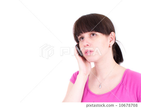 The young woman talks by a mobile phone The young woman talks by a mobile phone 10678708