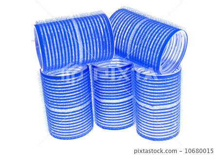 a few blue hair curlers on a white background a few blue hair curlers on a white background 10680015