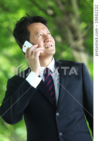 Asian businessman on the go 10682232