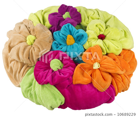 stack of colored towel shape of a flower isolated on white 10689229