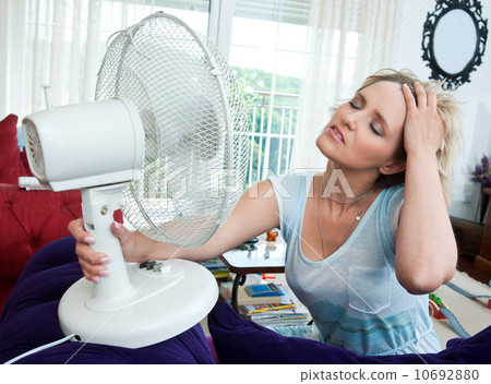 woman cooling herself 10692880