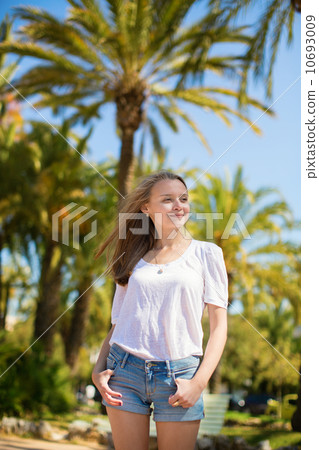Young beautiful girl enjoying sunny day in Cannes 10693009