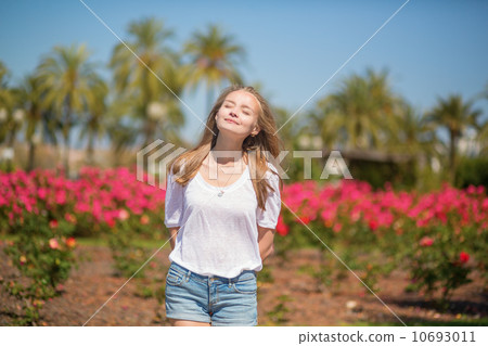 Young beautiful girl enjoying sunny day in Cannes 10693011