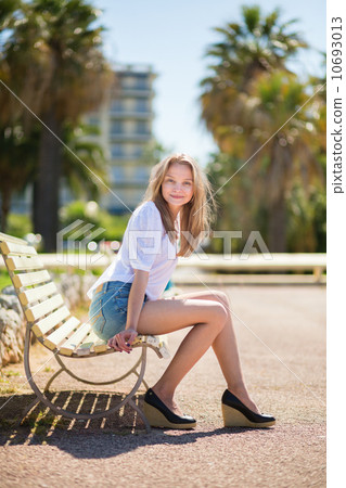 Young beautiful girl enjoying sunny day in Cannes 10693013