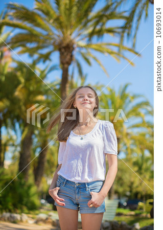 Young beautiful girl enjoying sunny day in Cannes 10693014