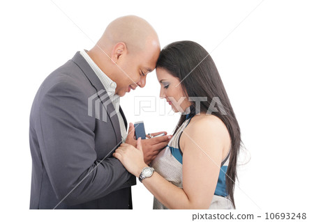 african man making a proposal to his girlfriend african man making a proposal to his girlfriend 10693248