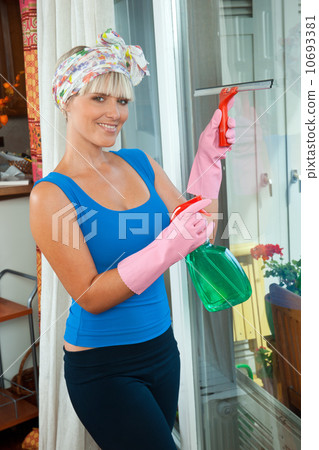 woman cleaning glass window 10693381