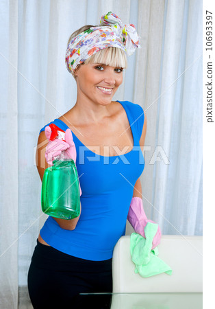 woman cleaning glass table woman cleaning glass table 10693397