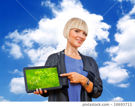 blond woman holding tablet blond woman holding tablet 10693713