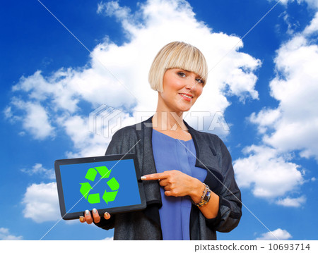 attractive blond woman holding tablet with recycle sign attractive blond woman holding tablet with recycle sign 10693714