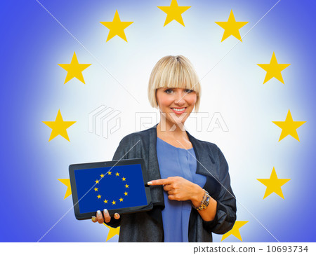 attractive blond woman holding tablet with europe flag attractive blond woman holding tablet with europe flag 10693734