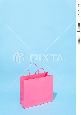Pink paper bag bargain sale image background material 10695276