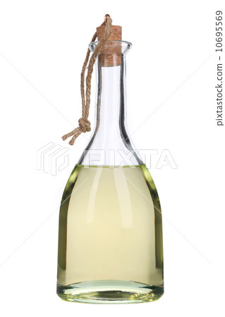 Small bottle of olive oil with cork stopper. Small bottle of olive oil with cork stopper. 10695569