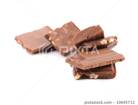 Tasty morsel of milk chocolate with nuts 10695712