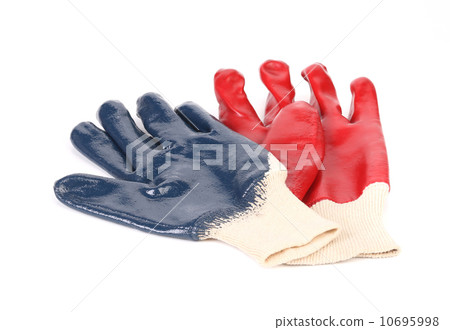 red and blue Gloved hand of a construction red and blue Gloved hand of a construction 10695998