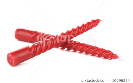 Two red spiral candle. 10696234