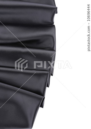 Black silk soft folds close up. Texture. 10696444