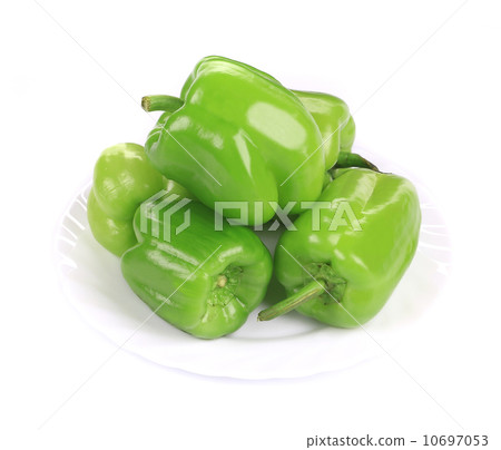 Green peppers in the plate. Green peppers in the plate. 10697053