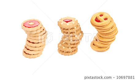 Three stacks of different biscuits. 10697881