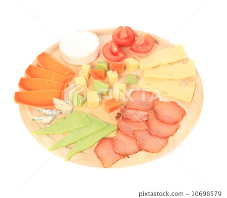 Meat and cheese on wooden desk. Meat and cheese on wooden desk. 10698579