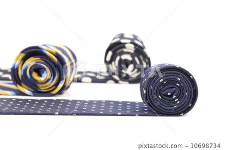 Three rolled multi-colored tie. Three rolled multi-colored tie. 10698734