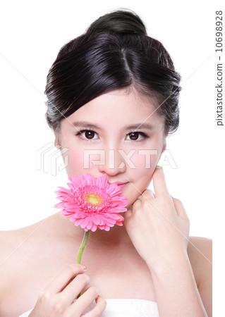 Young woman smile face with flower Young woman smile face with flower 10698928