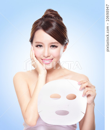 happy Young woman with cloth facial mask happy Young woman with cloth facial mask 10698947