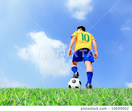 Soccer player man with ball 10699002