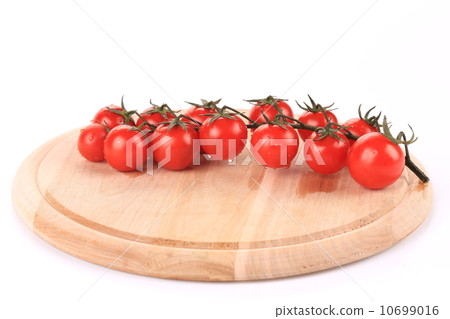 Juicy organic cherry tomatoes on platter. Juicy organic cherry tomatoes on platter. 10699016