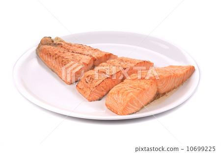 Slices of red fish fillet on plate. Slices of red fish fillet on plate. 10699225