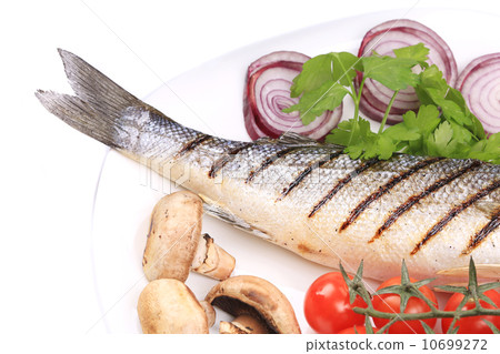 Grilled fish with red onion. 10699272