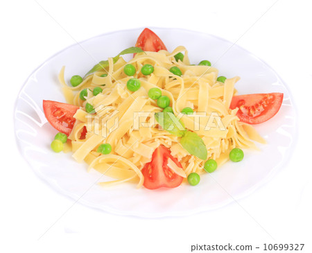 Pasta with green peas on plate close up. Pasta with green peas on plate close up. 10699327