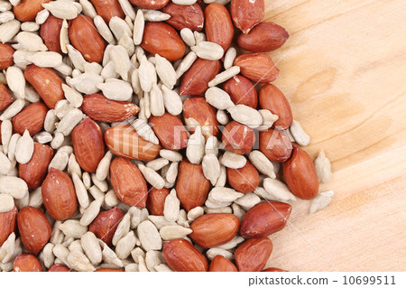 Peanuts and sunflower seeds. Peanuts and sunflower seeds. 10699511