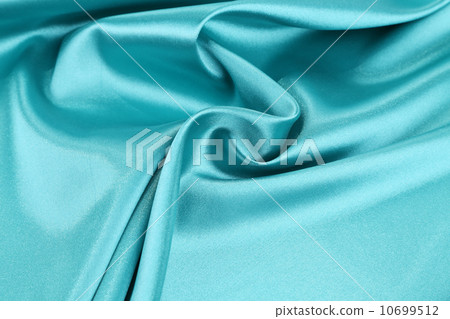 Soft folds and highlights of light blue silk. 10699512