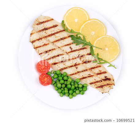 Fried fish fillet with vegetables. Fried fish fillet with vegetables. 10699521